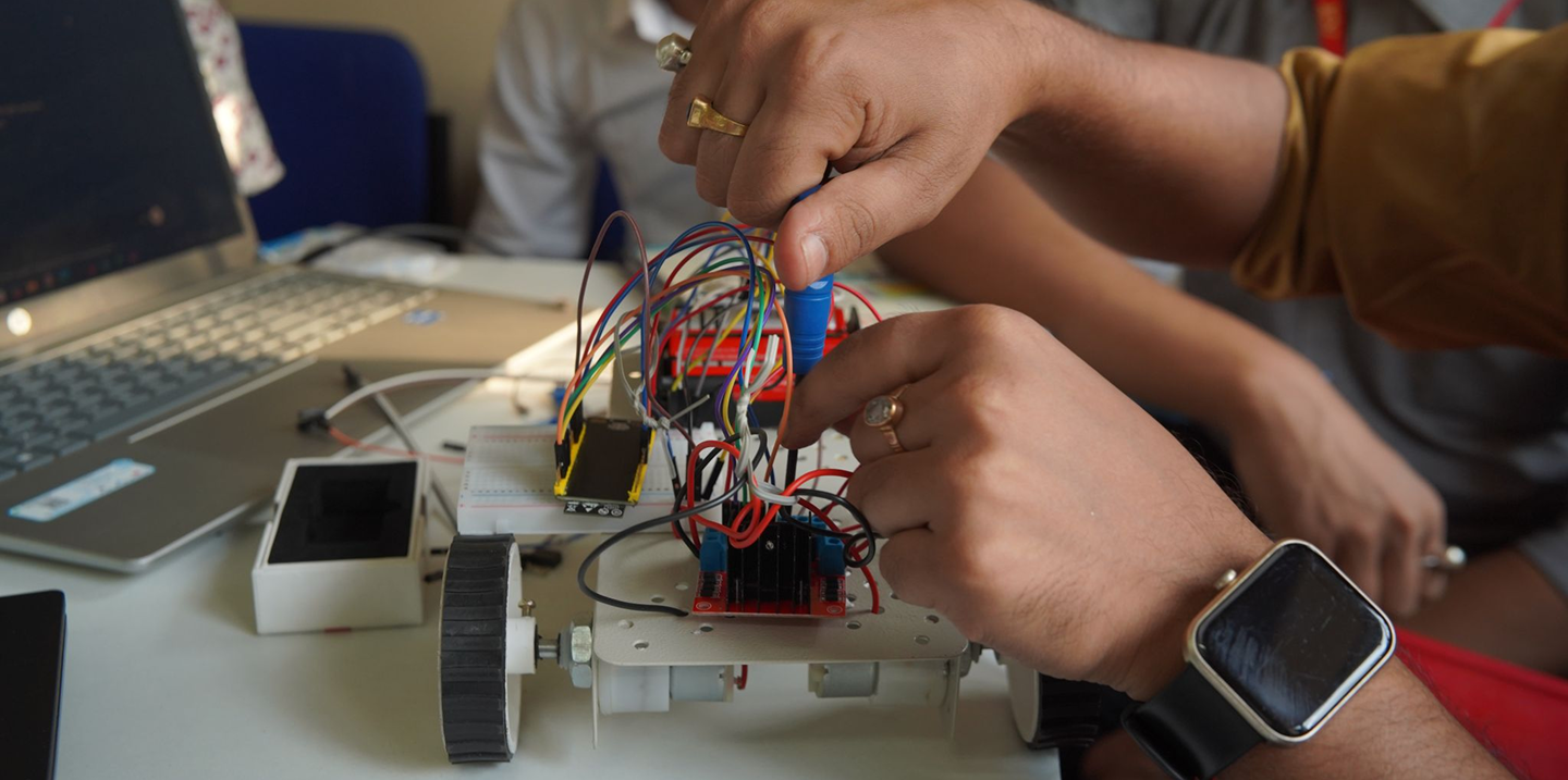 Students building an electronics project
